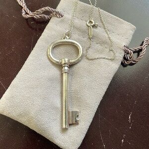 Tiffany & Co. key charm and Tiffany silver chain